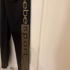 Bebe Sport Black Leggings/tights with sparkling Gold Side Logo